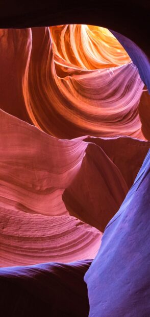 Smooth rock formations in Antelope Canyon displaying natural colors and textures