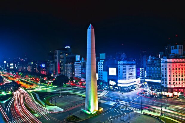 Night view of Argentina cityscape with obelisk and vibrant lights