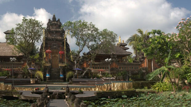 Ancient temple architecture surrounded by lush greenery in Bali