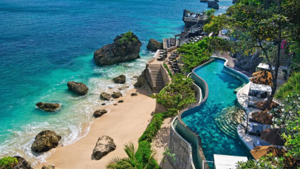 A beautiful Bali coastline with turquoise ocean and rocky beach scenery