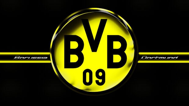 Borussia Dortmund logo with black and yellow colors on a dark background