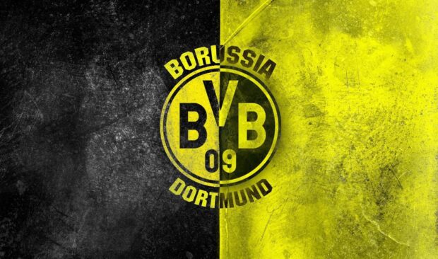 Borussia Dortmund logo with black and yellow grunge textures on a high definition desktop wallpaper