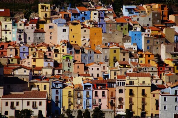 Colorful houses in Bosa Italy on a sunny day with vibrant architecture
