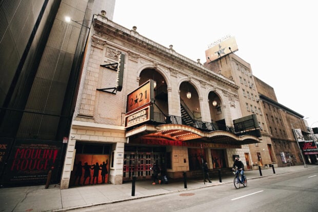 Historic theater on Broadway with Richard Rodgers sign and city street scene