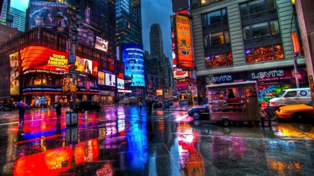 Vibrant Broadway street scene with glowing billboards and wet pavement reflections