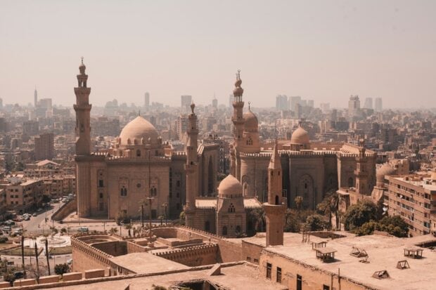 Historic architecture in Cairo Egypt with domes and minarets in the cityscape