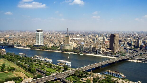 A panoramic view of Cairo Egypt with the Nile River and city buildings on a clear day