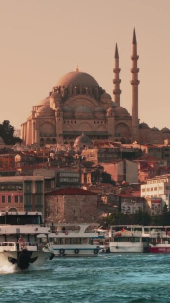 Historic mosque architecture in Cairo Egypt with cityscape and waterfront