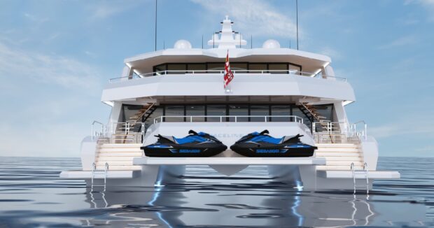 Luxury catamaran with two blue jet skis docked at the stern on calm water