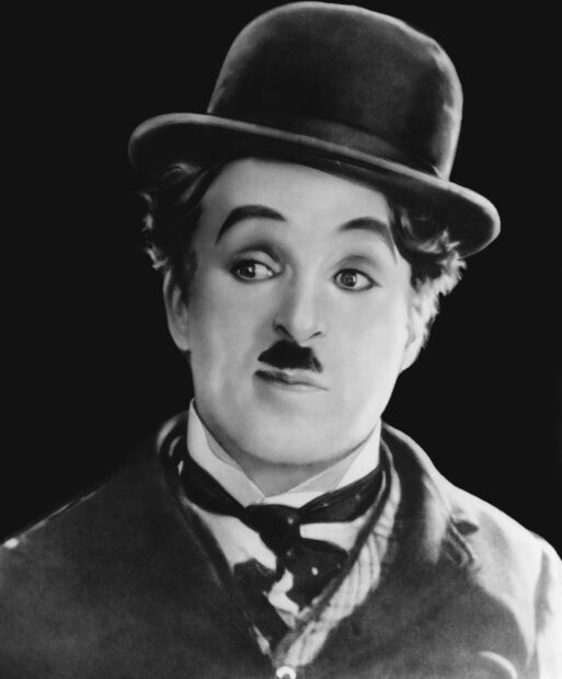 Charlie Chaplin classic character portrait wearing a bowler hat and bow tie in black and white