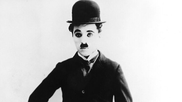 Charlie Chaplin classic silent film actor wearing a bowler hat and mustache