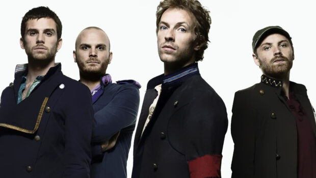 The Coldplay band members pose together in a high quality studio shot