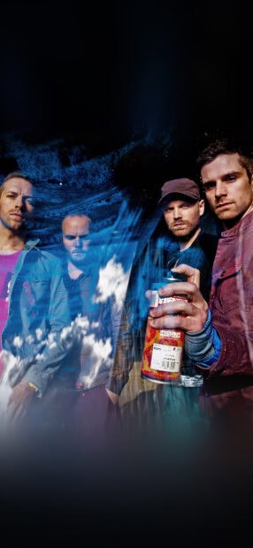 Coldplay band members posing with a spray paint can against a blue artistic background