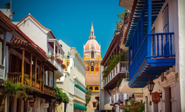 Colonial street with colorful balconies in Colombia city center