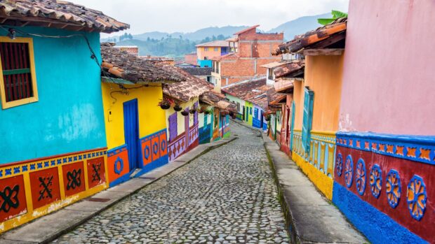 Colorful street with vibrant houses in Colombia showcasing traditional architecture and culture