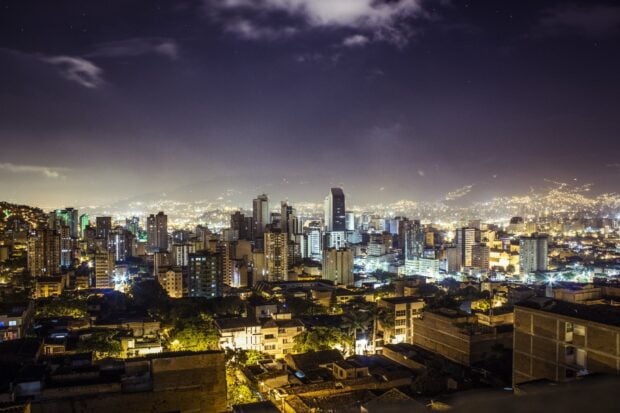 Night cityscape of Colombia showing urban lights and tall buildings