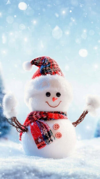 A cute snowman wearing a colorful scarf and hat in a snowy winter scene