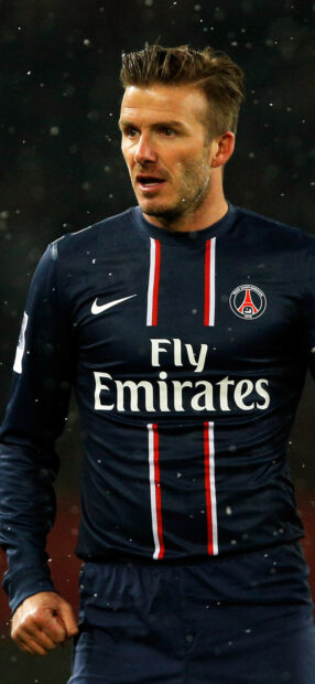 David Beckham wearing Paris Saint Germain jersey during a football match