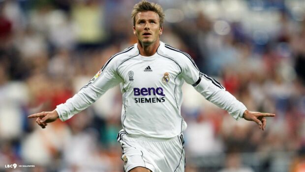 David Beckham celebrating with arms outstretched on the football field