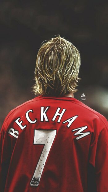 David Beckham wearing a red jersey with number 7 and blonde hair viewed from behind