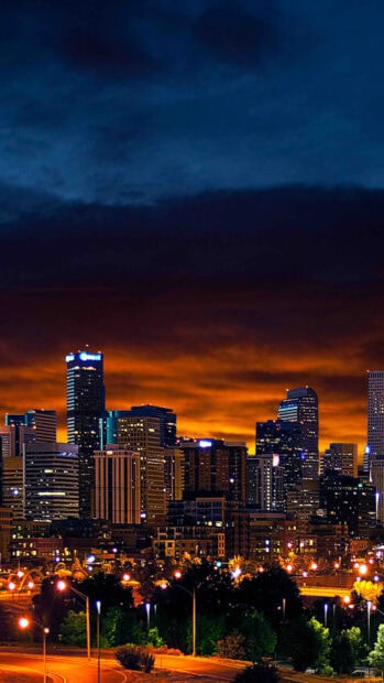 Denver Colorado city skyline during sunset with vibrant evening sky