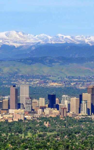 Denver cityscape with mountains in the background Denver Colorado