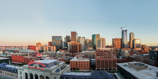 Denver skyline with Union Station and modern skyscrapers at sunset