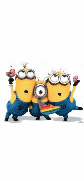 Three minions from Despicable Me celebrating with a colorful party blower and drinks