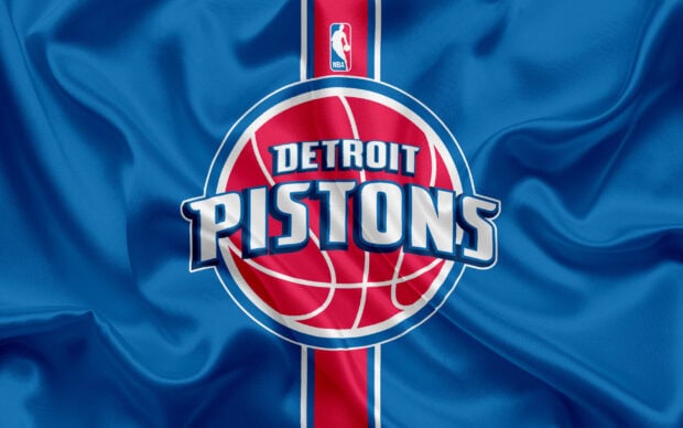 Detroit Pistons logo on a blue and red fabric background with detailed texture