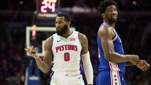 Detroit Pistons player expressing frustration during a game against an opponent