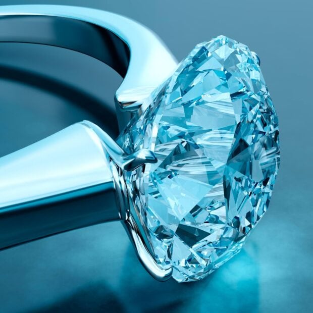 Close up of diamond jewelry with sparkling crystal cut diamond
