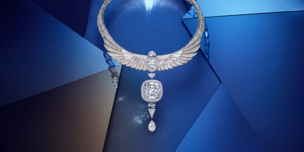 Diamond Jewelry Wallpapers HD Desktop Diamond jewelry necklace with large gems on a reflective blue geometric background