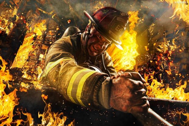 Fireman fighting a fierce fire in a burning building with intense flames everywhere