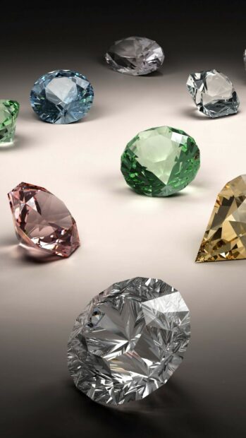 Various colorful gemstone sparkling in high detail on a smooth surface
