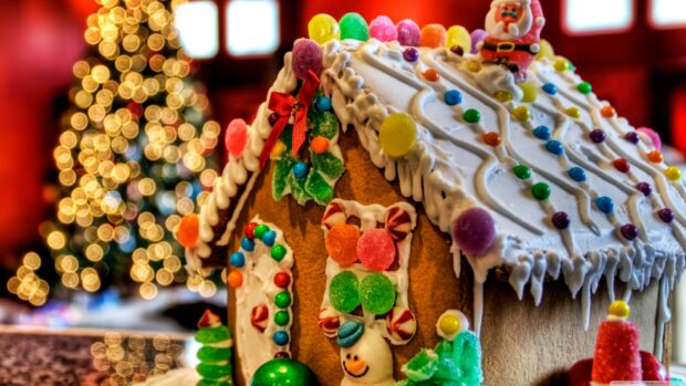 A detailed gingerbread house decorated with colorful candies and frosting in a festive setting