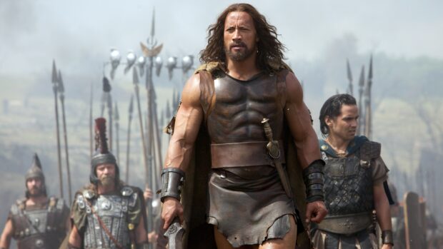 Strong Hercules hero in ancient armor leading soldiers in battle scene