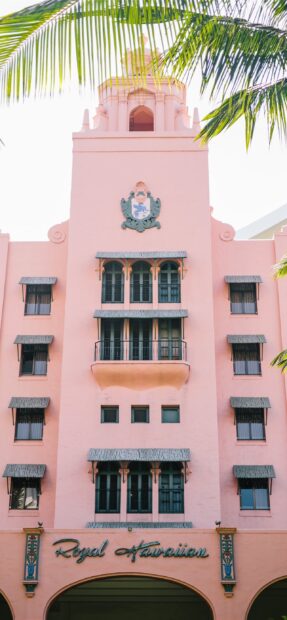 Royal Hawaiian building with palm leaves in Honolulu