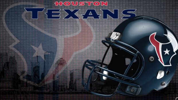 A Houston Texans football helmet with city skyline in the background