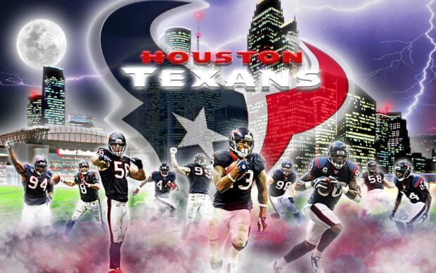 Houston Texans players celebrate on the field with Houston city skyline in the background