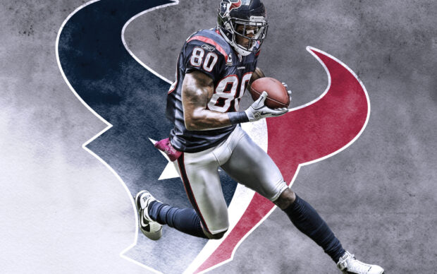 A Houston Texans player wearing uniform number 80 catching a football against the team logo background