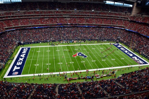 Aerial view of Houston Texans football field filled with fans at the stadium