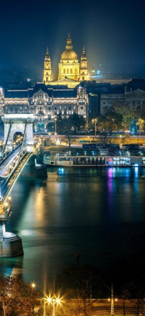 Night view of Budapest architecture with river and chain bridge in Hungary