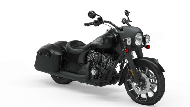 Black Indian motorcycle with vintage design and saddlebags on a white background