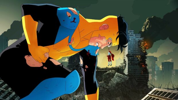 The invincible hero with a torn suit stands in a destroyed city with a flying opponent in the background