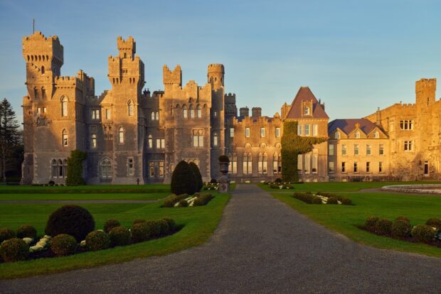 Irish Castle Wallpaper HD Desktop Irish castle standing tall with manicured lawn and clear sky in the evening light