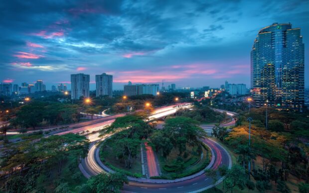 Jakarta cityscape at dusk with circular road and skyscrapers in HD quality