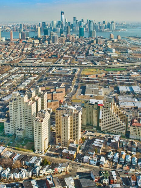 Aerial view of Jersey City skyline with tall buildings and urban landscape in high definition