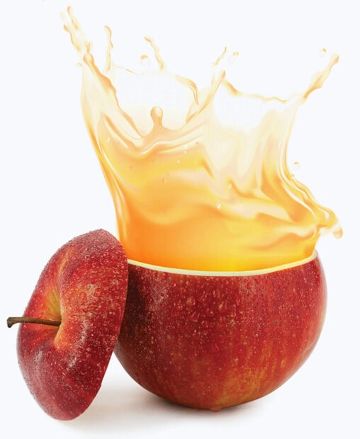 Fresh apple juice splash coming out of a red apple filled with juice