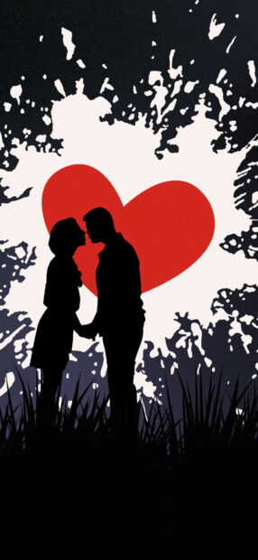 Silhouette of a couple sharing a romantic kiss in front of a red heart