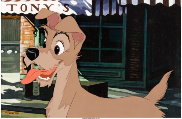 A happy Tramp dog character from Lady And The Tramp standing outside Tony's restaurant